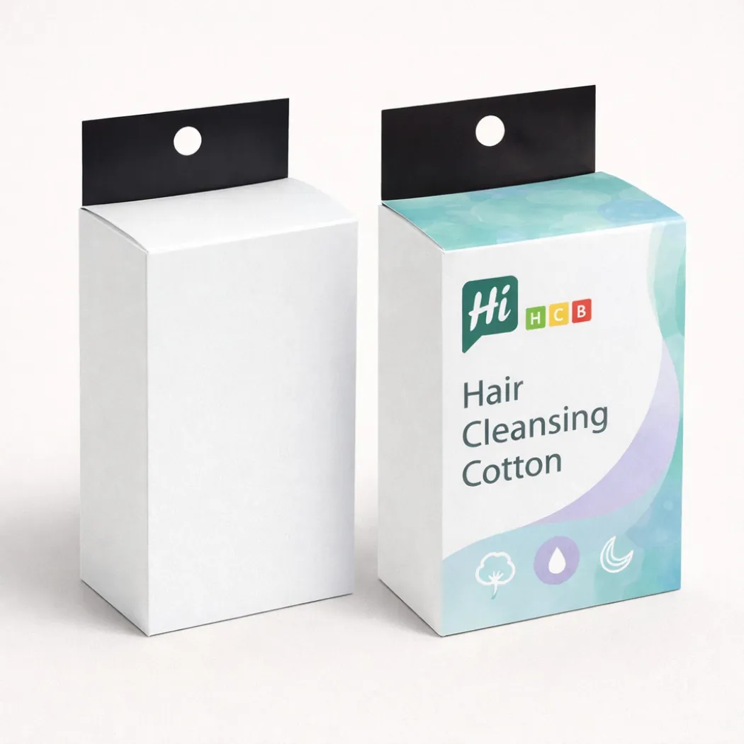 Two upright cardboard boxes for hair cleansing cotton- featuring black hanging tabs for retail display- class=